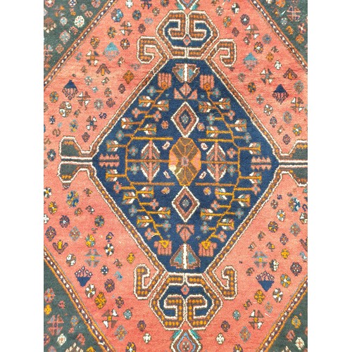 2243 - A hand woven Iranian blue and red rug 170cm x 260cm