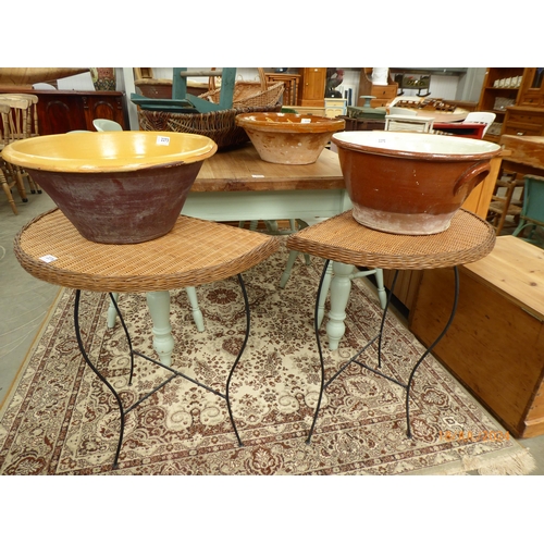 2423 - A pair of demi lune rattan tables