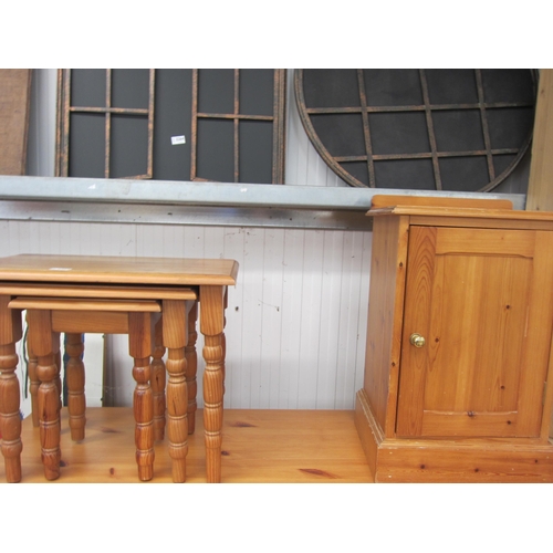 2263 - A nest of three pine tables and pine pot cupboard