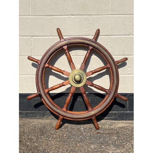 2060 - A late 19th / early 20th Century teak and brass mounted ship’s wheel, 122cm diameter