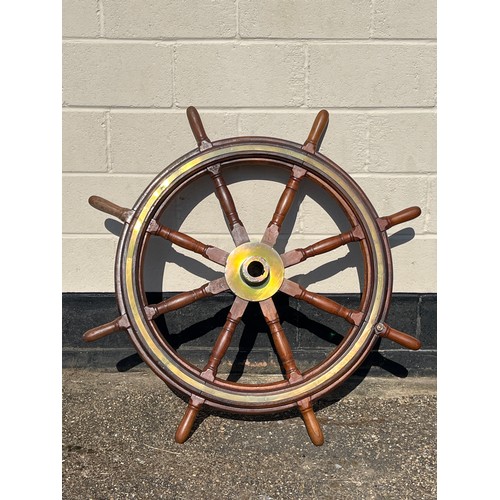 2060 - A late 19th / early 20th Century teak and brass mounted ship’s wheel, 122cm diameter