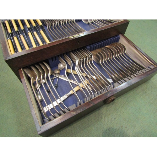 4004 - A Taylor's of Sheffield oak cased part canteen of cutlery together with assorted flatware including ... 