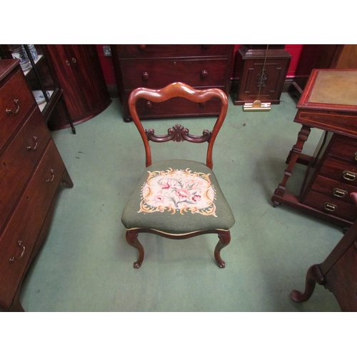 4200 - A set of four William IV rosewood chairs with carved 