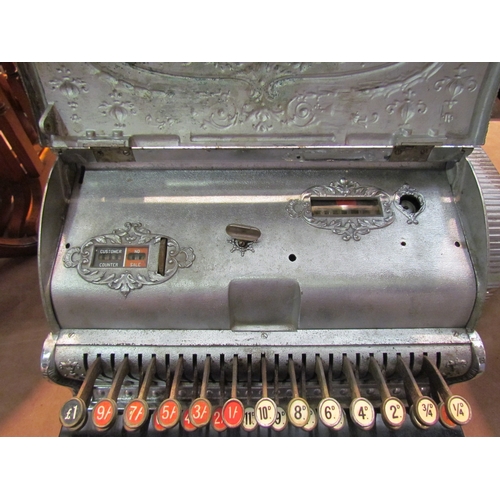 4248 - An NCR cash register; model 346, serial No. 796099, made in 1909.  Nickel plated case, Dolphin patte... 