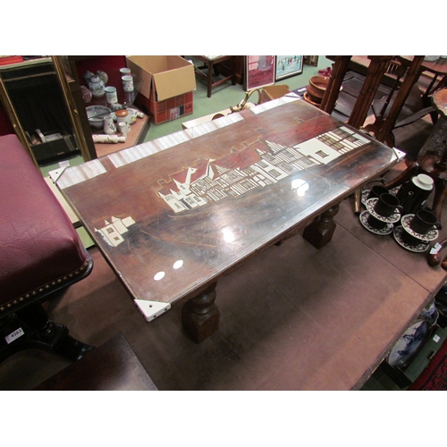 4259 - A coffee table with carved and painted image of the Swan Inn, Lavenham.  Glass topped and on squat b... 