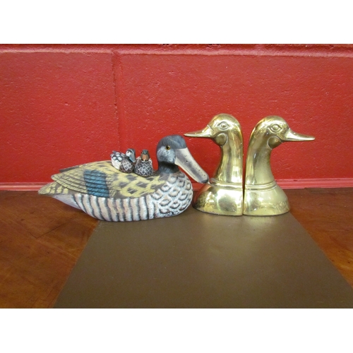 4261 - A pair of brass bookends as ducks and three painted wooden duck figures