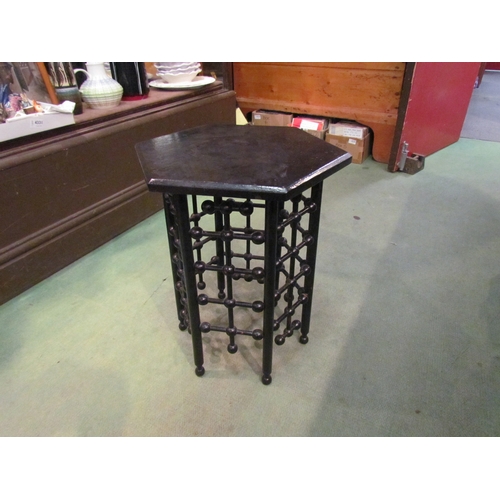 4266 - A ball design ebonised occasional table with hexagonal top, 48cm tall x 36cm diameter