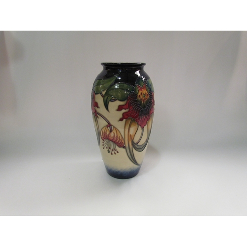 4293 - A Moorcroft Anna Lily design vase, 26cm tall approx