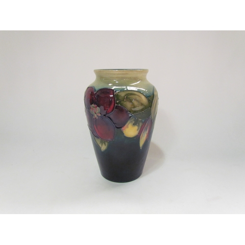 4313 - A Moorcroft 'Clematis' pattern vase, 13cm tall