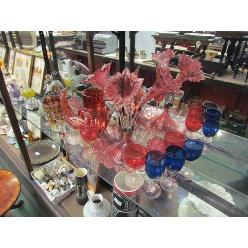 4328 - A collection of coloured glass items including cranberry and ruby glass, Bohemian examples and a cra... 