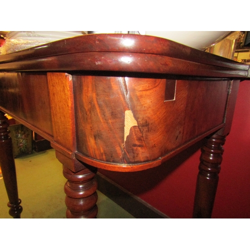 4001 - A Circa 1850 flame mahogany tea/side table the fold-over swivel top on turned and tapering legs, mis... 