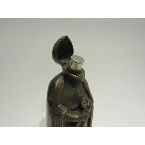 4461 - A novelty bronzed figural table lighter in the form of a knight, 19cm tall