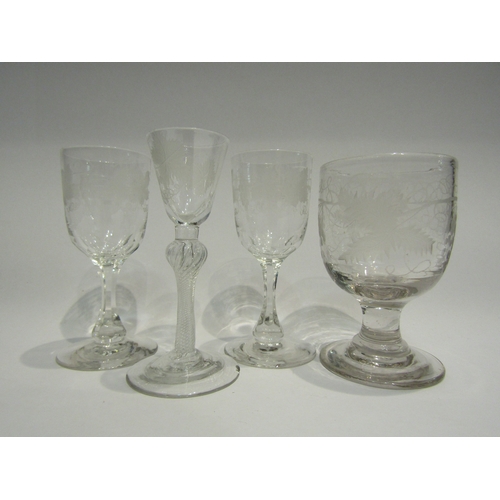 4467 - Four drinking glasses, each etched with vine, including a late 18th Century example with air twist s... 