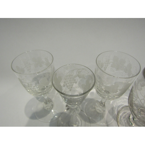 4467 - Four drinking glasses, each etched with vine, including a late 18th Century example with air twist s... 