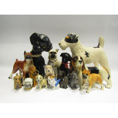 4475 - A box of miscellaneous dog figures to include Black Forest, ceramic and metal examples