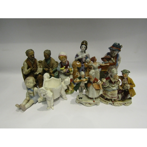 4477 - A box of miscellaneous figures to include: Peasant boy and girl, Nao style young boy seated with boo... 