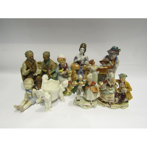 4477 - A box of miscellaneous figures to include: Peasant boy and girl, Nao style young boy seated with boo... 