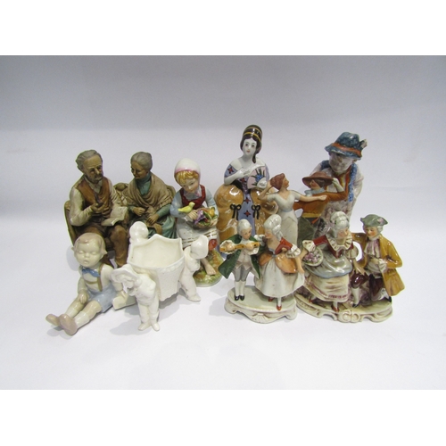 4477 - A box of miscellaneous figures to include: Peasant boy and girl, Nao style young boy seated with boo... 