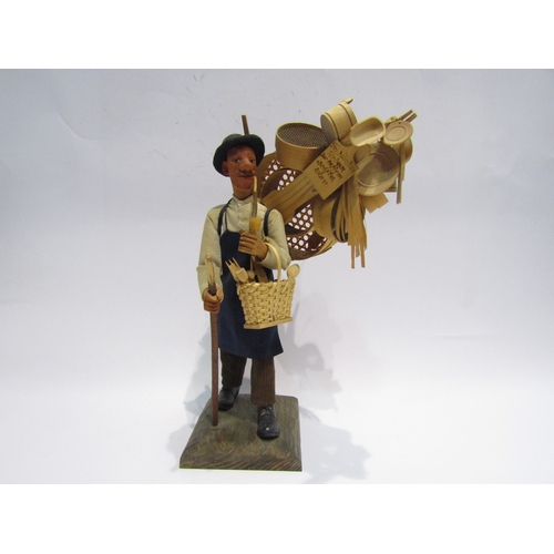 4484 - A Balsa wood figure of a tinker, 33cm tall