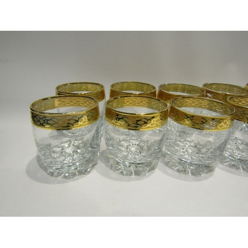 4487 - A set of twelve heavy whisky glasses with gilt rims