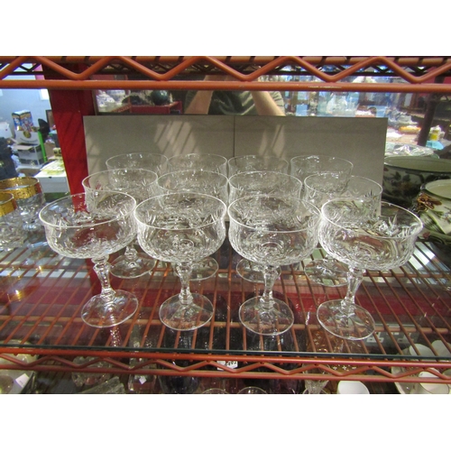 4488 - A set of twelve cut glass champagne saucers