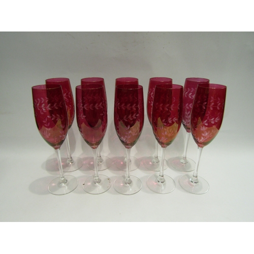 4498 - A set of ten 20th Century cranberry cut glass champagne flutes