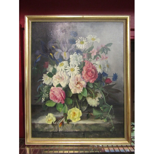 4499 - I.J. HAGUE: An oil on canvas of floral still-life.  Signed bottom right. Gilt framed. 50cm x 40cm im... 