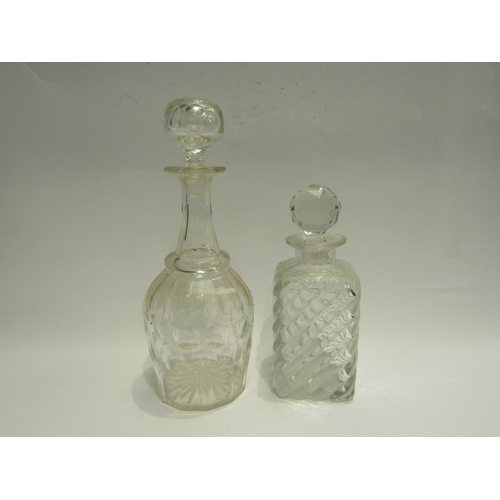 4501 - Two 19th Century decanters with associated stoppers, wrythen square form and a round/facet cut examp... 