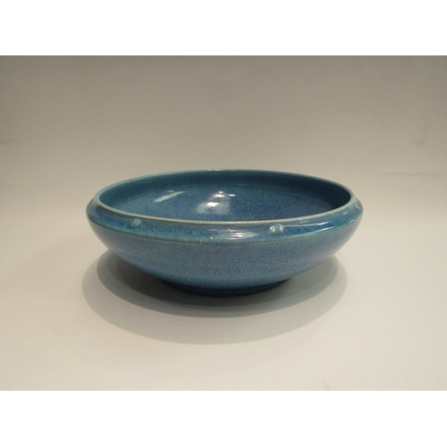 4502 - A Pilkingtons Royal Lancastrian blue glazed pottery bowl, 27cm diameter