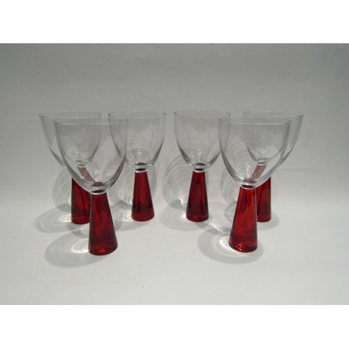 4514 - A set of six wine glasses with red glass stems