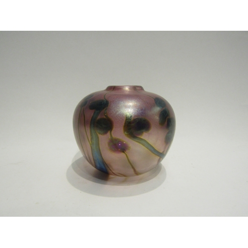 4523 - An iridescent art glass vase of globular form, signed to base, 9.5cm tall