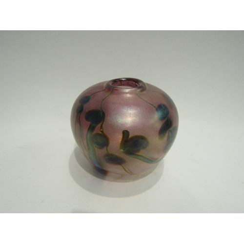 4523 - An iridescent art glass vase of globular form, signed to base, 9.5cm tall