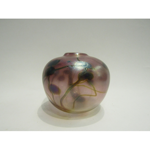 4523 - An iridescent art glass vase of globular form, signed to base, 9.5cm tall