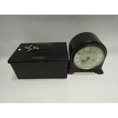 4531 - A Smiths Enfield bakelite clock with keys and a Vintage First Aid box