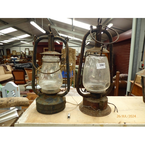 2061 - Two tilley lamps glass a/f