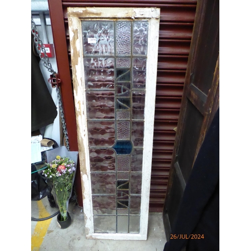 2074 - A 1930s stained and leaded glass window panel