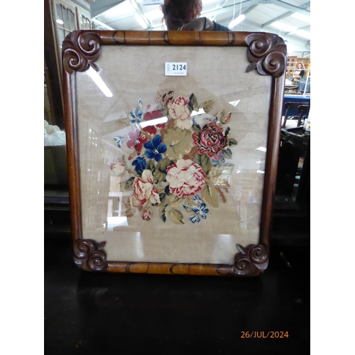 2124 - A William IV rosewood framed needlepoint of flowers