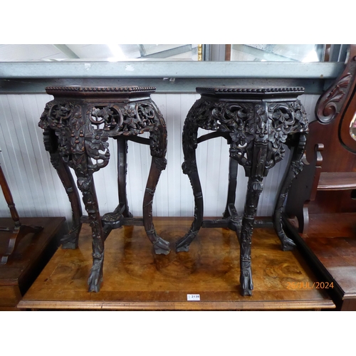 2137 - A pair of  late 19th century Oriental marble topped Jardinere Stands, heavily carved hardwood with c... 