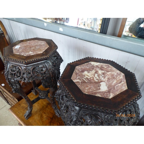 2137 - A pair of  late 19th century Oriental marble topped Jardinere Stands, heavily carved hardwood with c... 