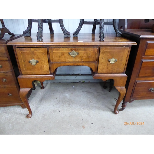 2138 - An 18th Century walnut kneehole desk or side table