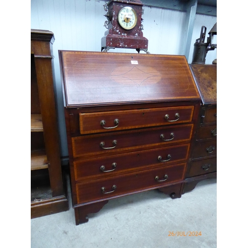 2151 - An Edwardian mahogany inlaid bureau, Waring label