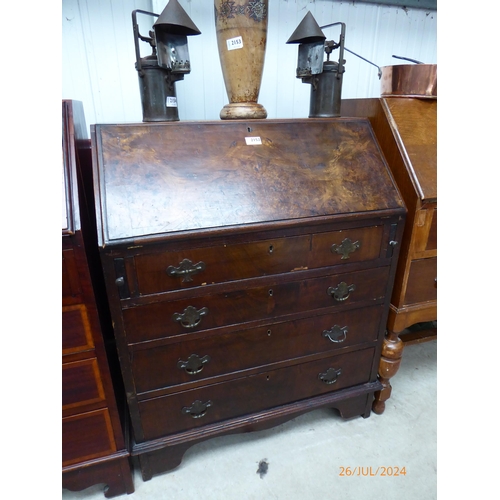 2152 - A burr walnut bureau with four drawers