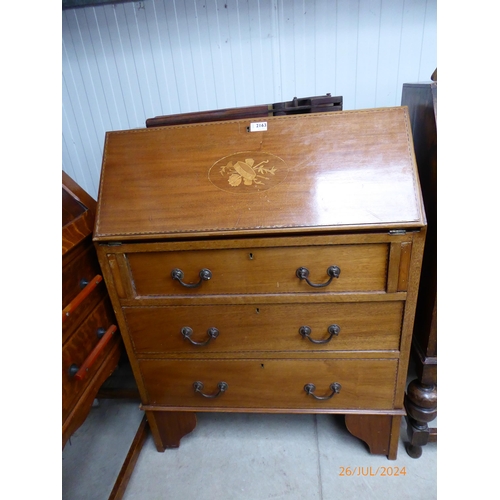 2163 - An Edwardian mahogany bureau, the fall front inlaid with marquetry over a three drawer front, raised... 