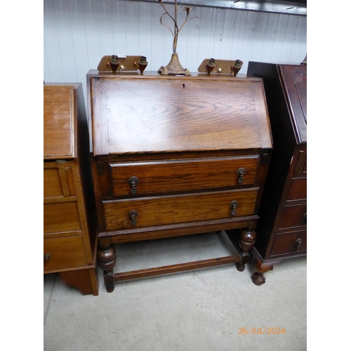 2166 - A 1940's oak two drawer bureau