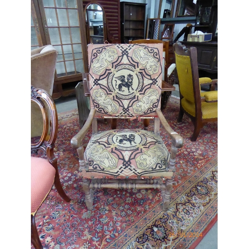 2203 - A late 19th Century walnut throne chair with needle point upholstery