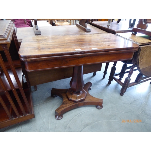 2217 - A 19th Century rosewood card table, round cornered fold-over top, quatreform base, top for re-baizin... 