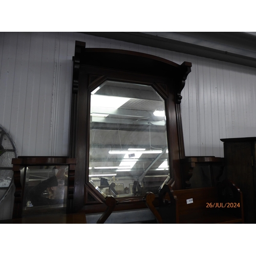 2222 - A Victorian walnut framed overmantel mirror