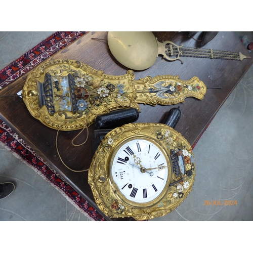 2244 - A French comtoise clock with weights and pendulum