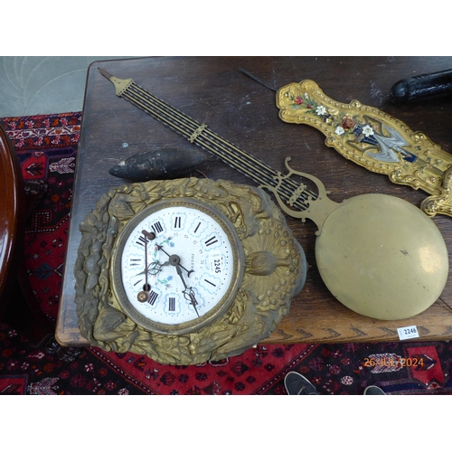 2245 - A late 19th Century French comtoise enamel wall clock with large brass pendulum and key