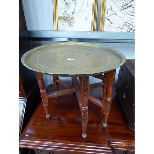 2252 - Two Indian brass topped tables